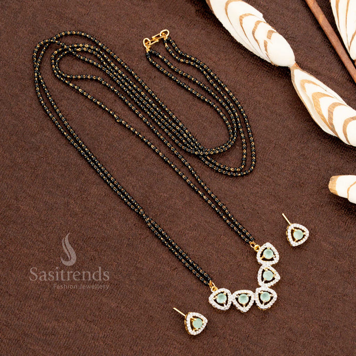 Stunning mint AD pendant set featuring a tri-petal drop design, Mangalsutra chain, and matching earrings, micro gold plated for a premium festive jewellery collection - Sasitrends