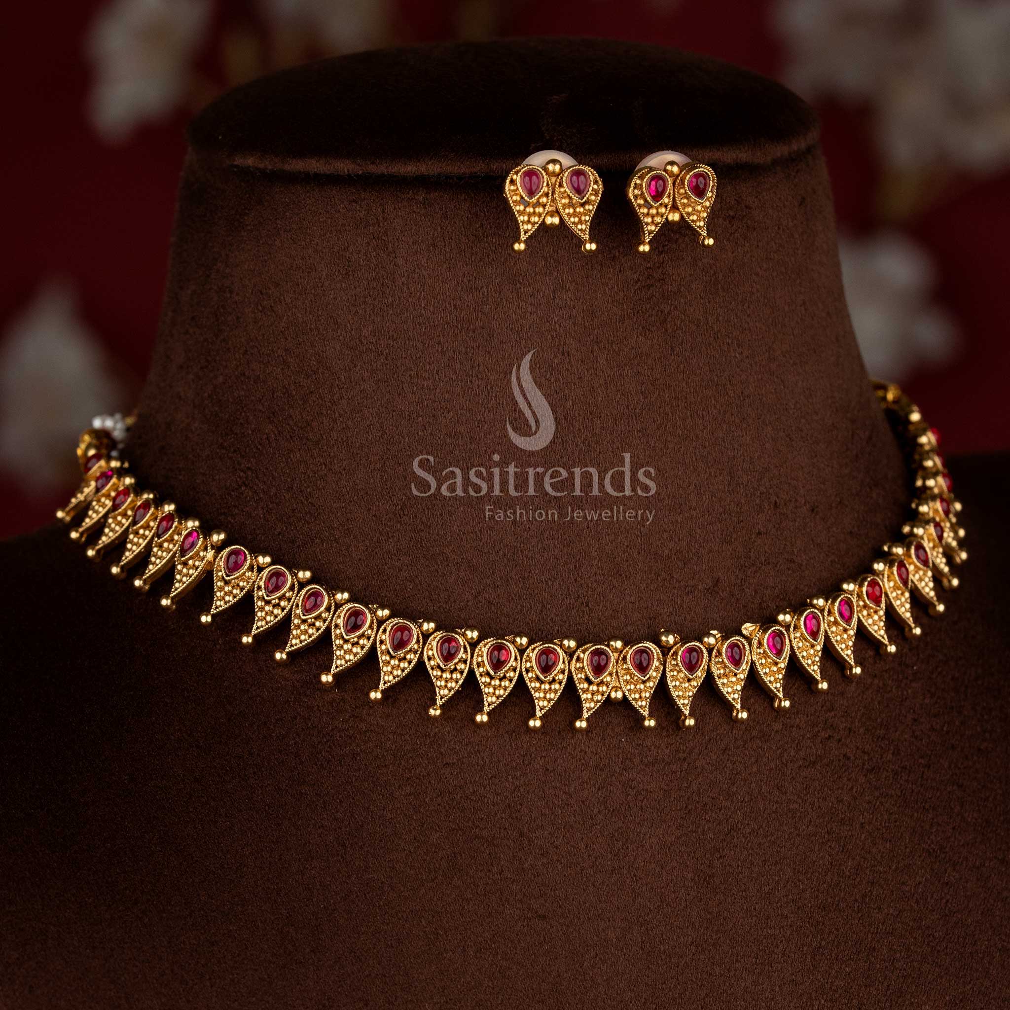 Opulent classic matte gold plated ruby necklace set with matching stud earrings for radiant celebration looks – Sasitrends