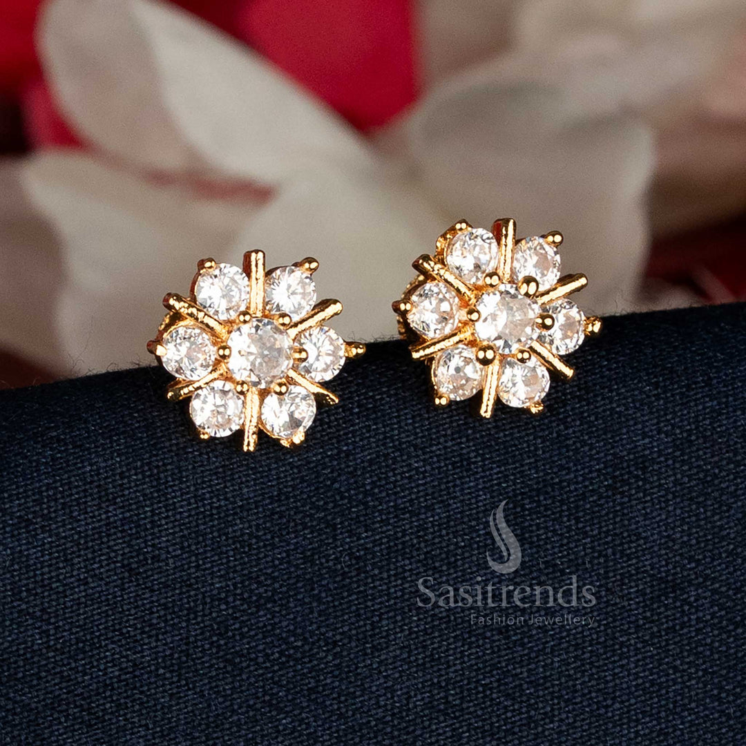 Bright Micro Gold Plated AD Stone Flower Stud Earrings in white, adorned with intricate embossed patterns, ideal for traditional and celebratory occasions — Sasitrends
