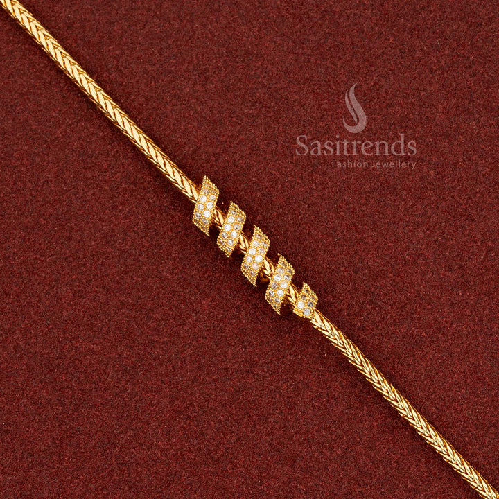 Crystal white micro gold compact spring Mugappu chain adorned with AD accents, perfect for cultural gatherings and timeless ethnic styling – Sasitrends