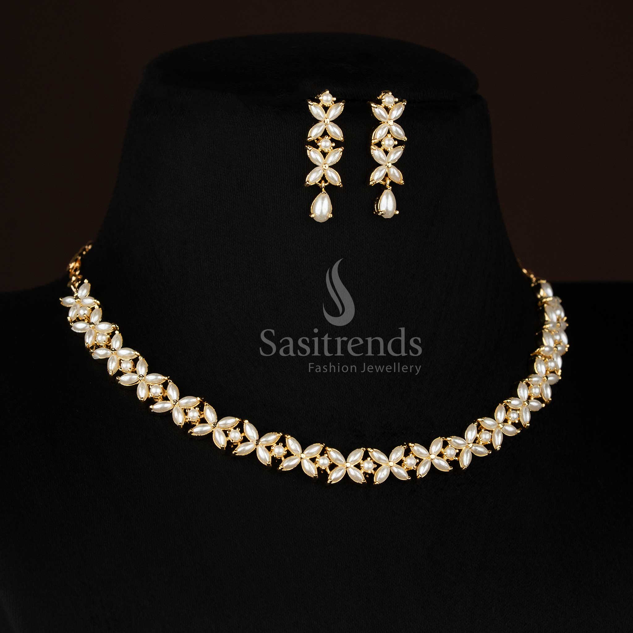 Ivory micro gold plated pearl four petal AD floral Necklace suitable for ethnic occasions and family gatherings - Sasitrends