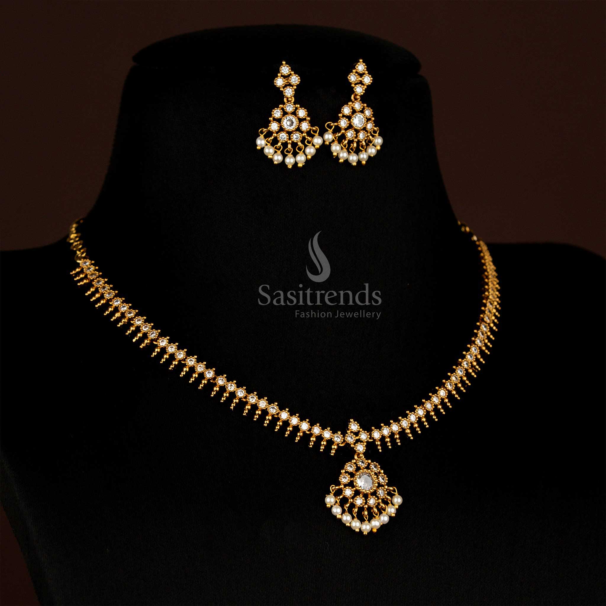 Elegant matte gold AD stone Necklace embellished with sparkling white circular floral patterns in dangle style for temple occasions and bridal celebrations – Sasitrends