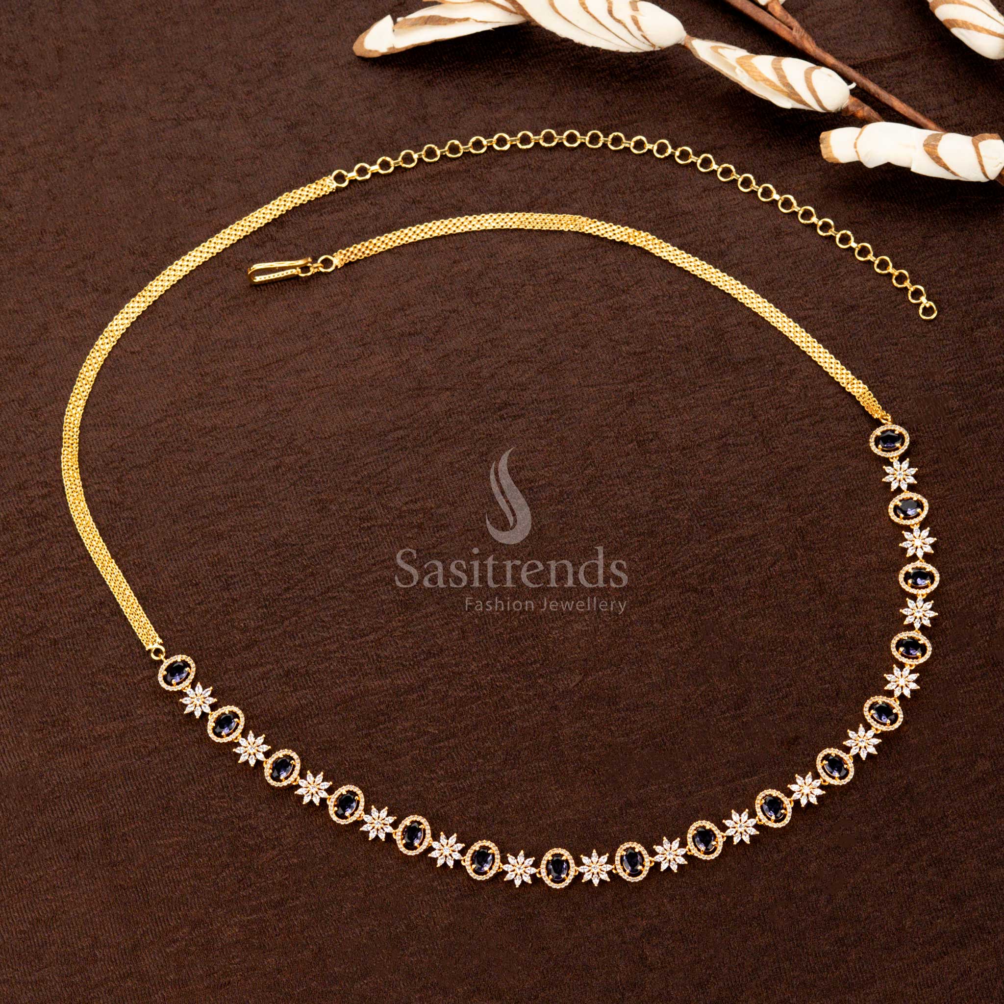 Majestic purple American diamond gold-plated hip belt featuring a dazzling oval stone, elegant floral designs, and a royal finish—perfect for sarees and festive styling - Sasitrends
