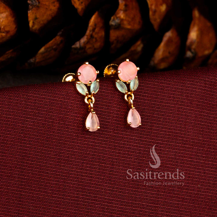 Opulent gold look earrings in pink-mint crafted with floral round AD cluster and sparkling brilliant teardrop accent – Sasitrends