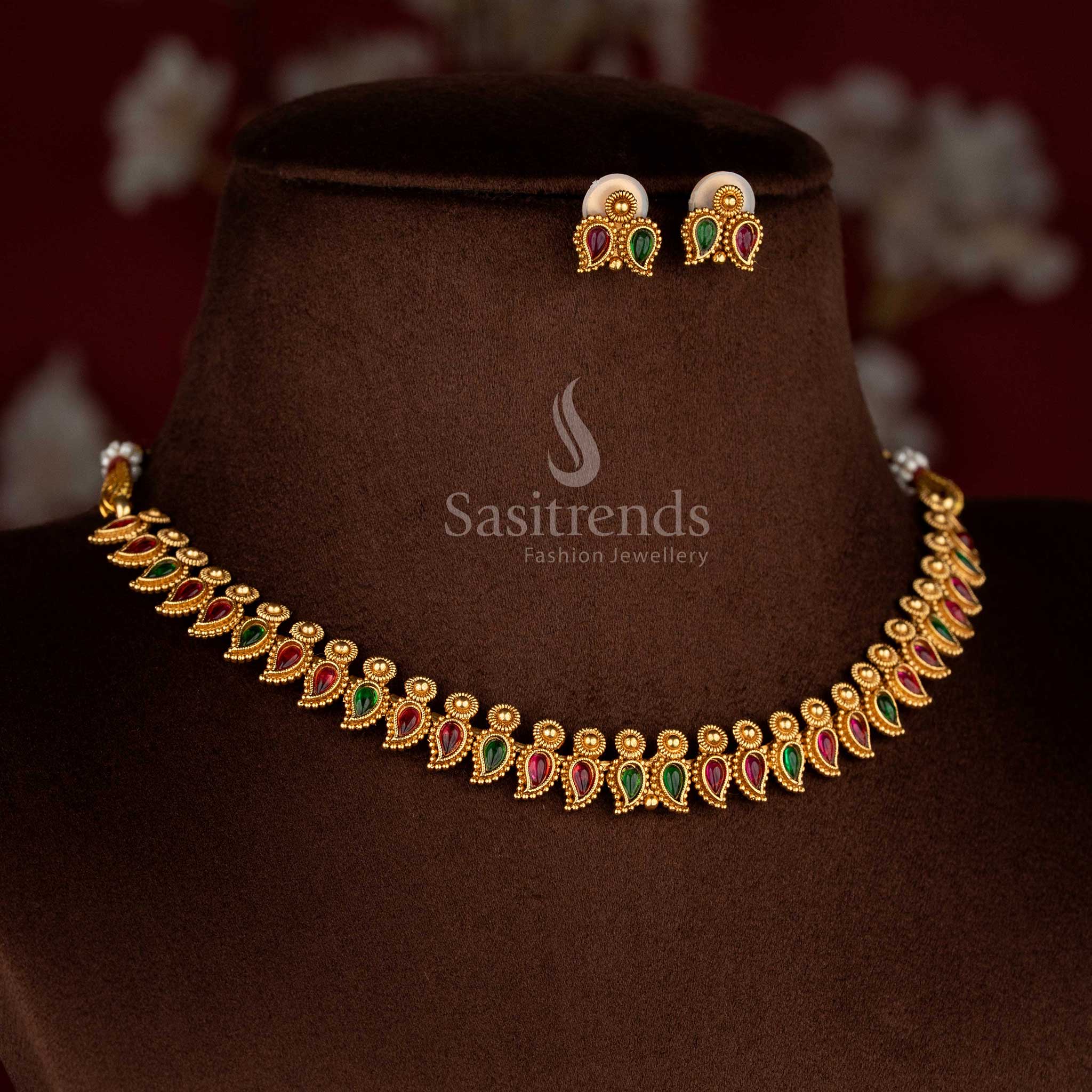 Vibrant classic matte gold plated ruby-green stonework necklace set with designer earrings for celebration-ready looks – Sasitrends
