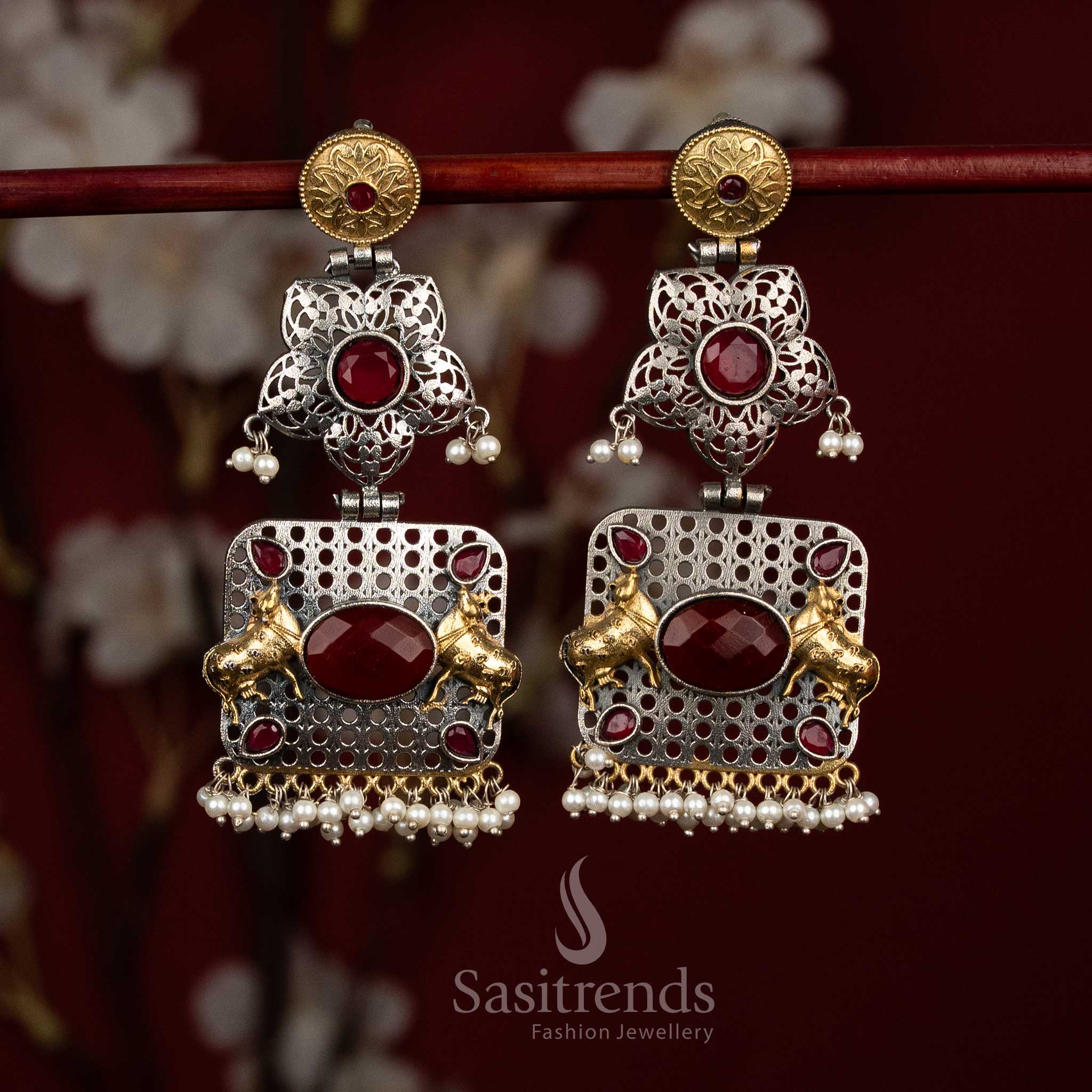 Opulent antique oxidised 92.5 silver ruby floral mandala Nandi bull panel earrings with oval Monalisa stones and linear pearl fringes for festive - jewellery - Sasitrends