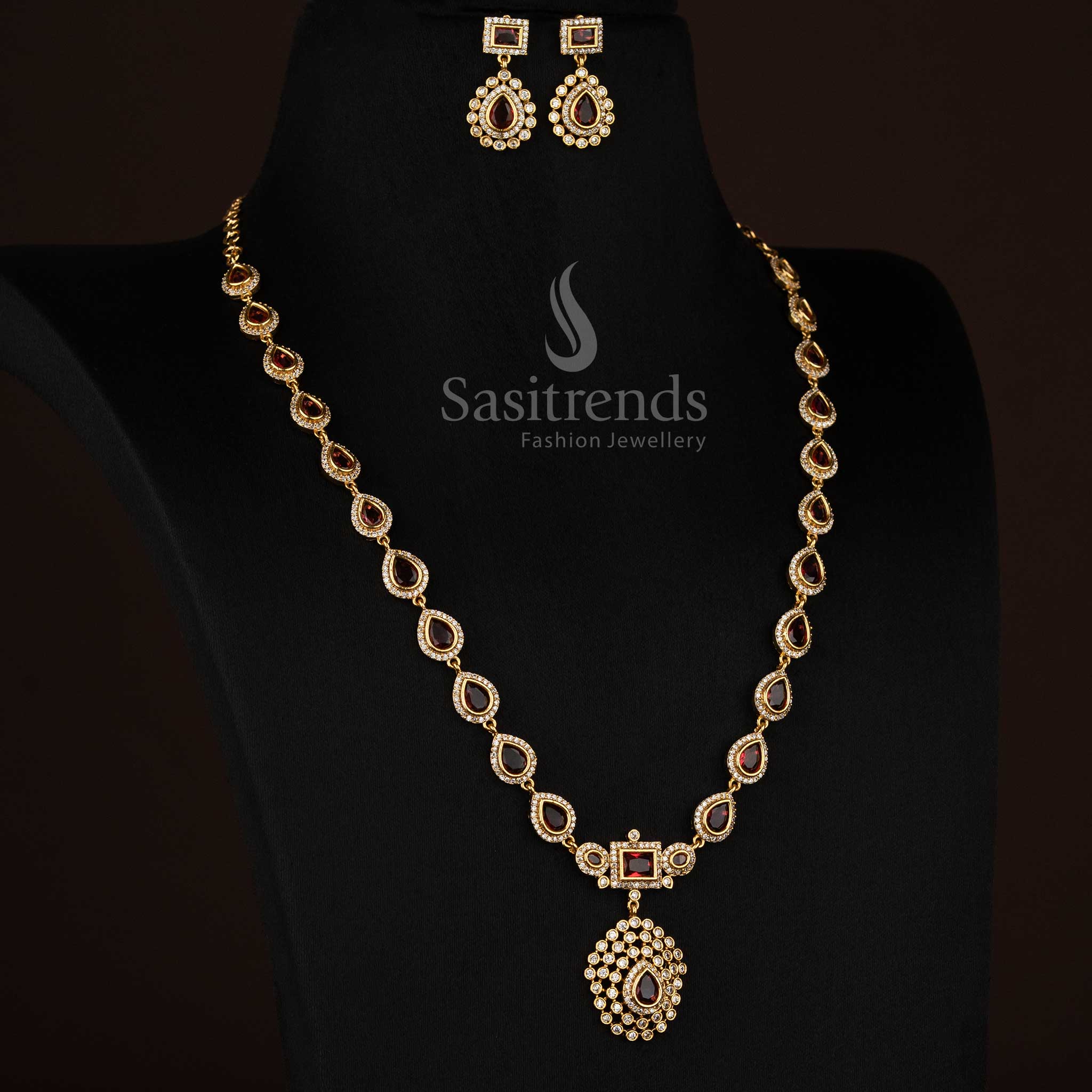 Opulent red American Diamond teardrop rectangle motif matte gold plated long necklace ideal for evening styling - Sasitrends
