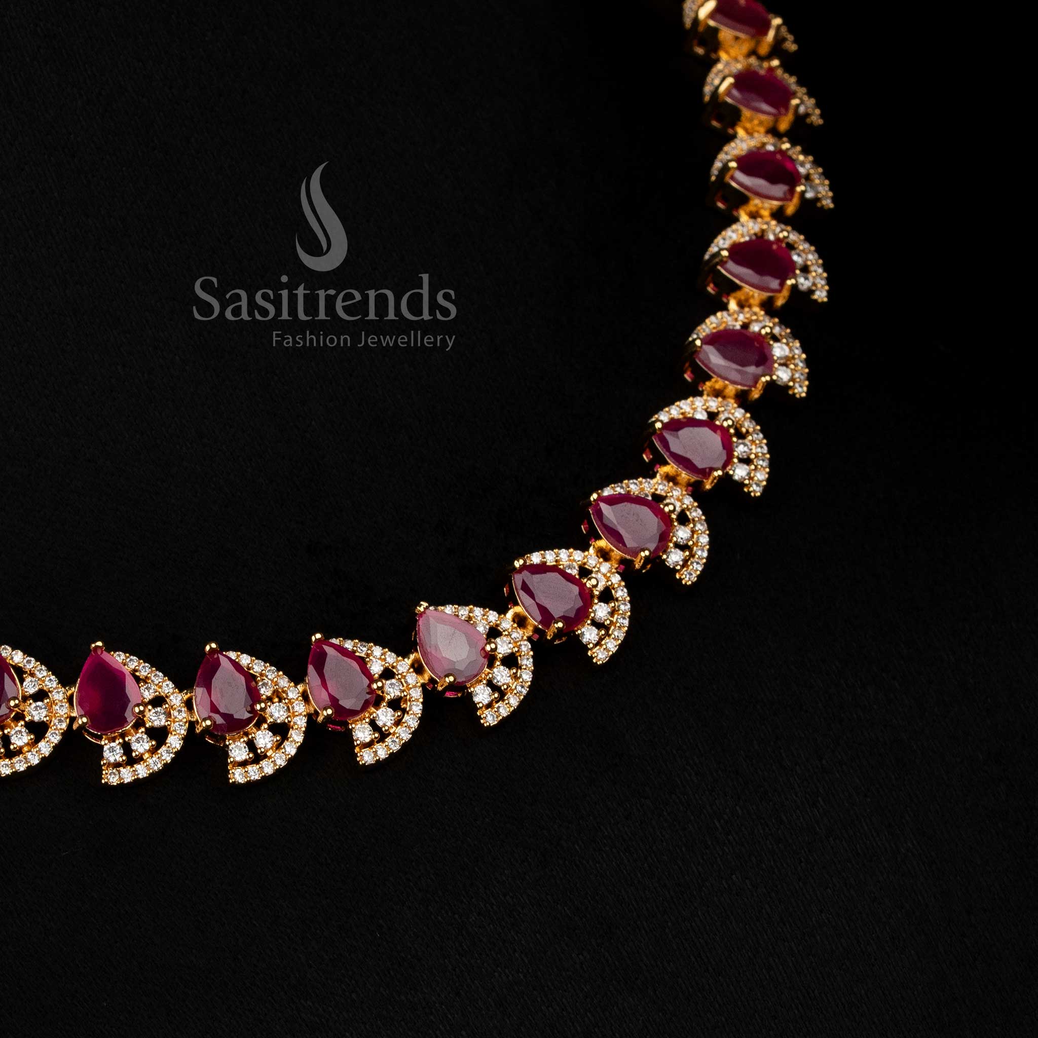 Glamorous ruby gold plated teardrop infinity necklace with sparkling American diamonds for luxury festive occasions - Sasitrends