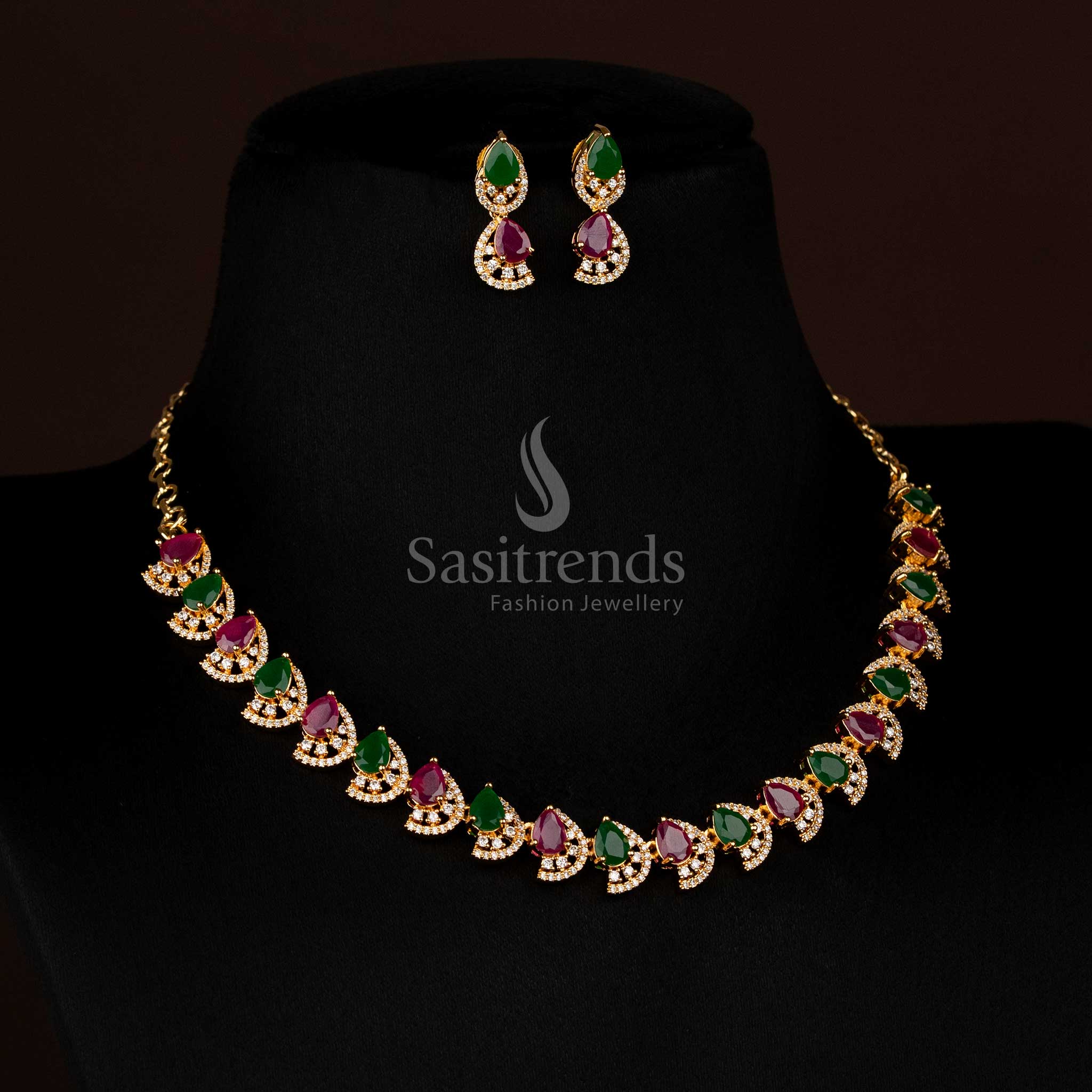 Chic ruby green dual finish gold plated infinity pendant necklace with teardrop design and AD accents for parties - Sasitrends