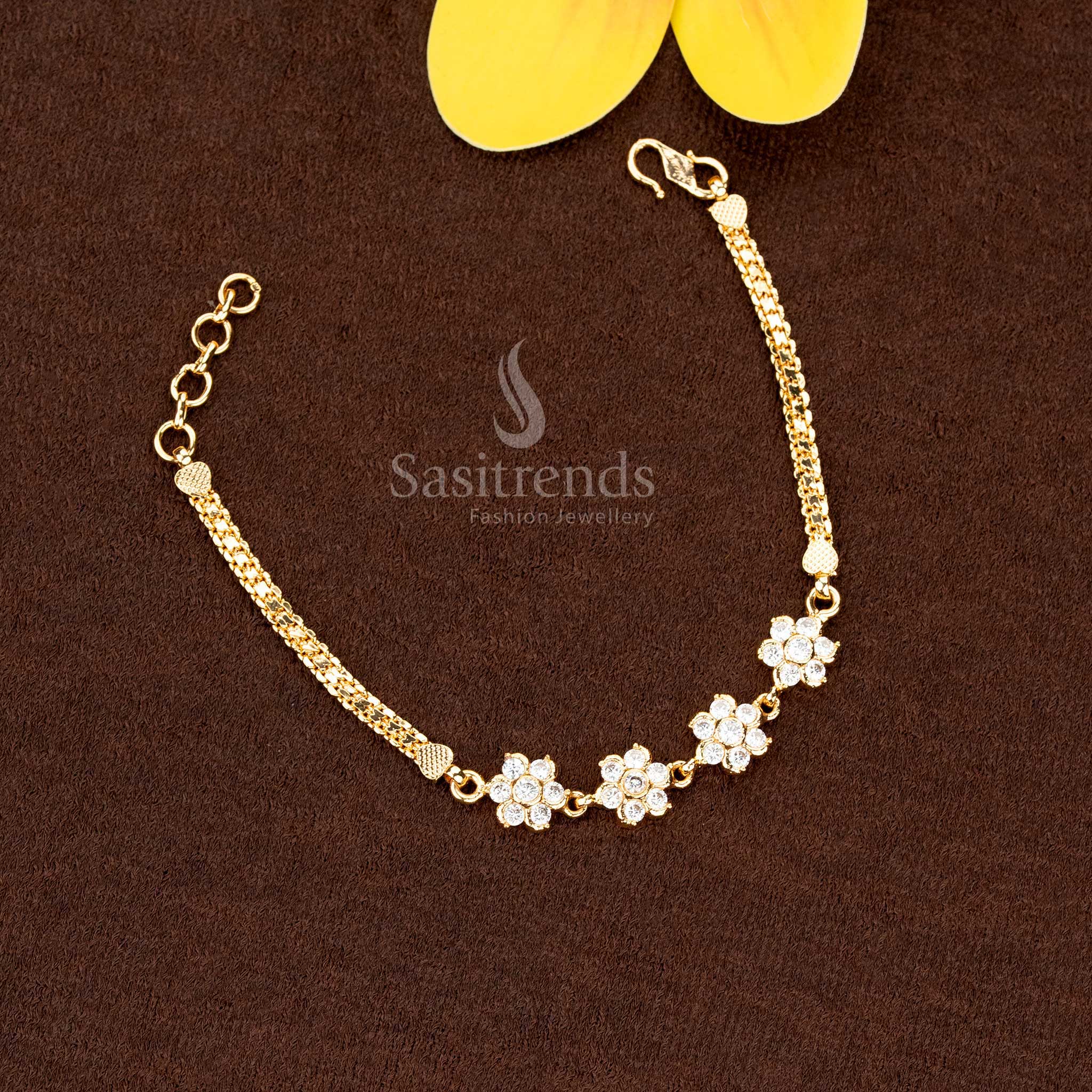 Luminous white micro gold plated Addigai bracelet with spiral 4 floral AD stones enhanced with Impon design, ideal to wear for celebrations and parties – Sasitrends
