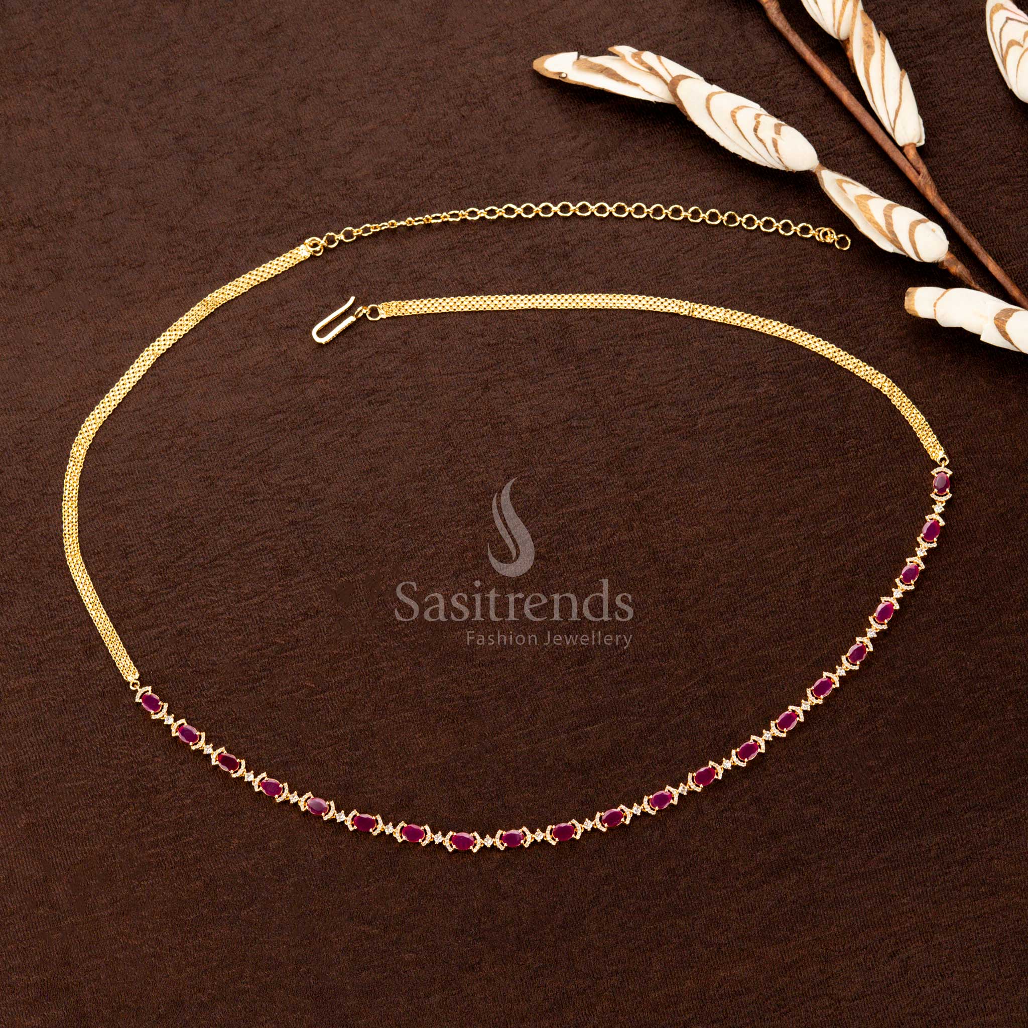 Radiant white and ruby American diamond hip belt with a glittering stonework pattern, intricate gold polish, and a sophisticated finish—perfect for weddings, special occasions, and ethnic fashion - Sasitrends