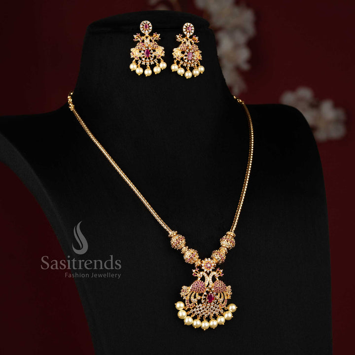 Elegant white ruby micro gold plated peacock AD pendant necklace jewellery set designed for festive gatherings, traditional attire and silk saree elegance - Sasitrends