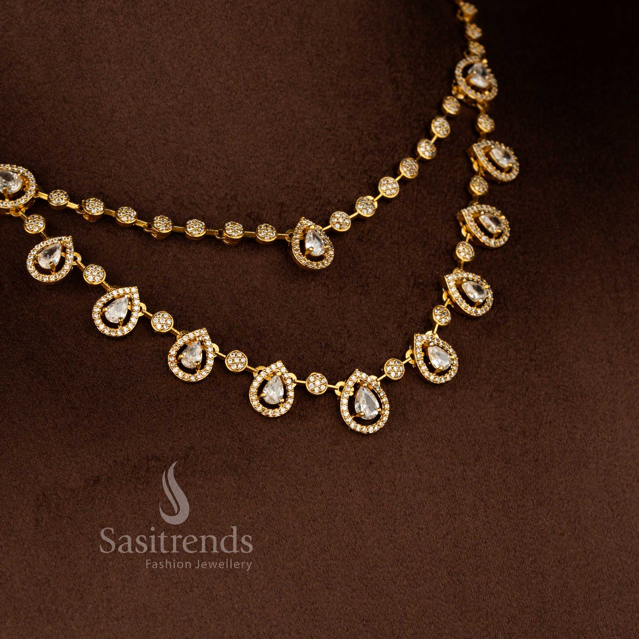 Elegant two line matte gold plated floral necklace with sparkling American diamonds in white ideal for bridal attire and grand festive occasions – Sasitrends