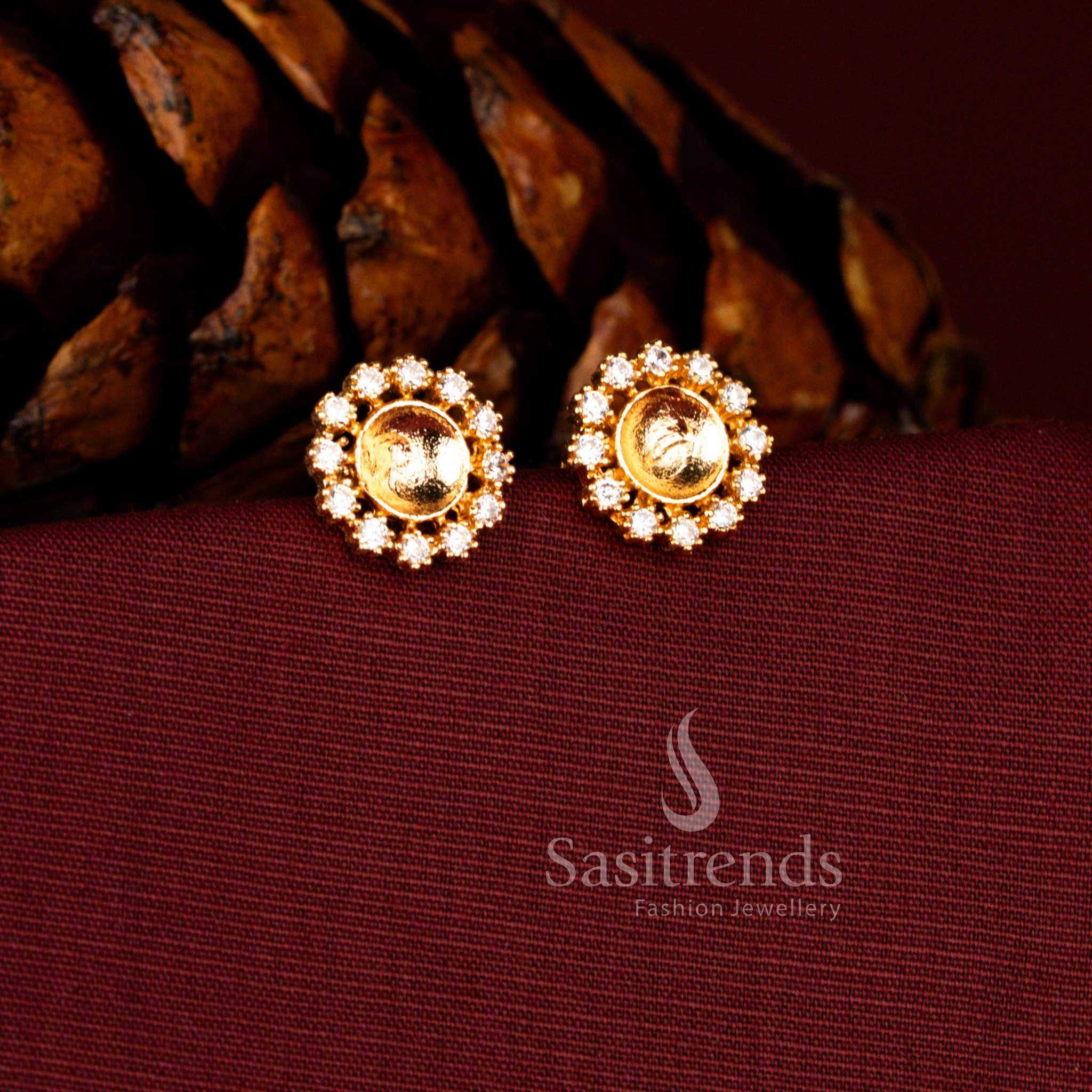 Elegant one gram earrings in white crafted with round sunburst halo design and smooth domed gold centre for classic styling – Sasitrends