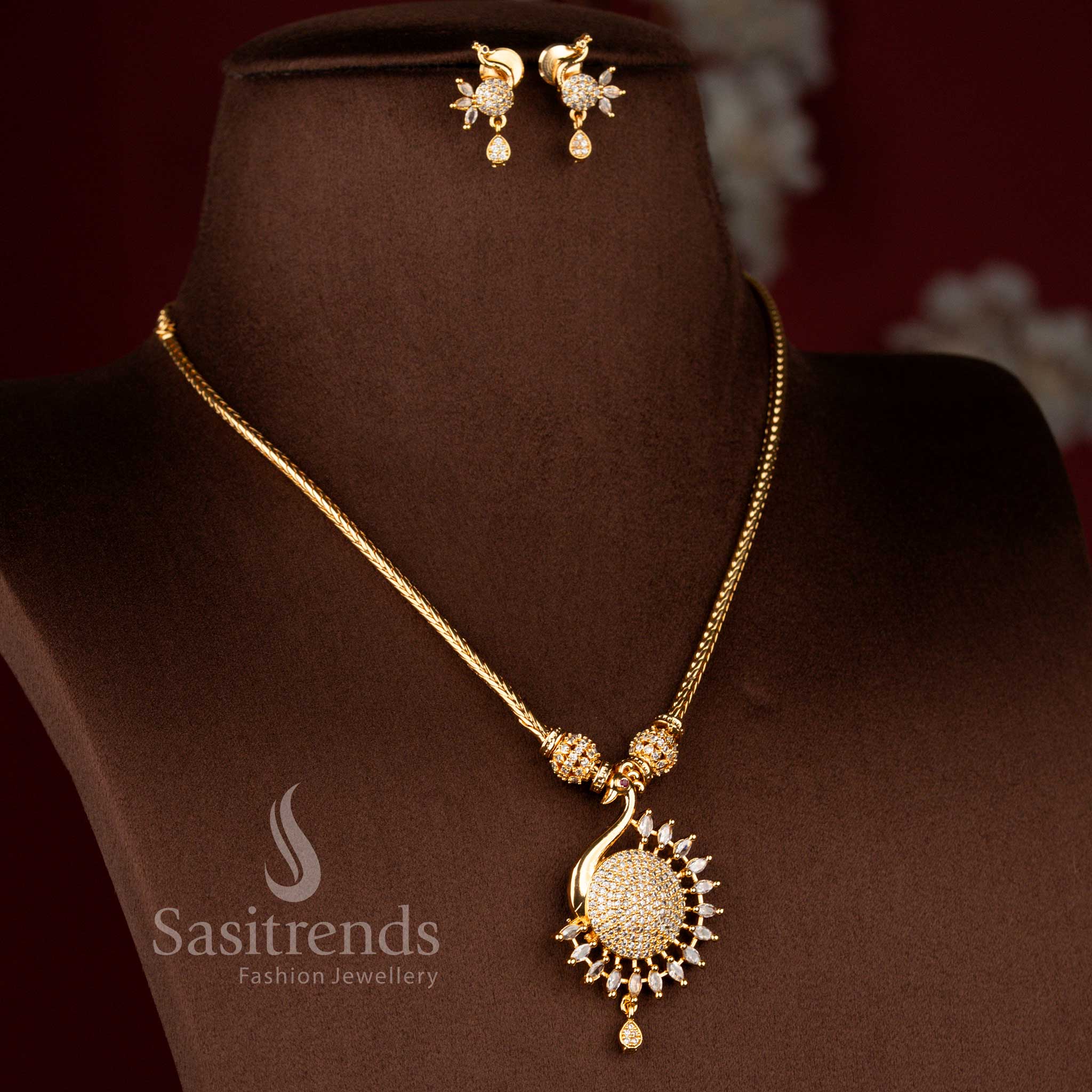 Luminous micro gold plated peacock pendant necklace in white highlighted with sparkling gemstones and pearls, exquisite one gram jewellery – Sasitrends