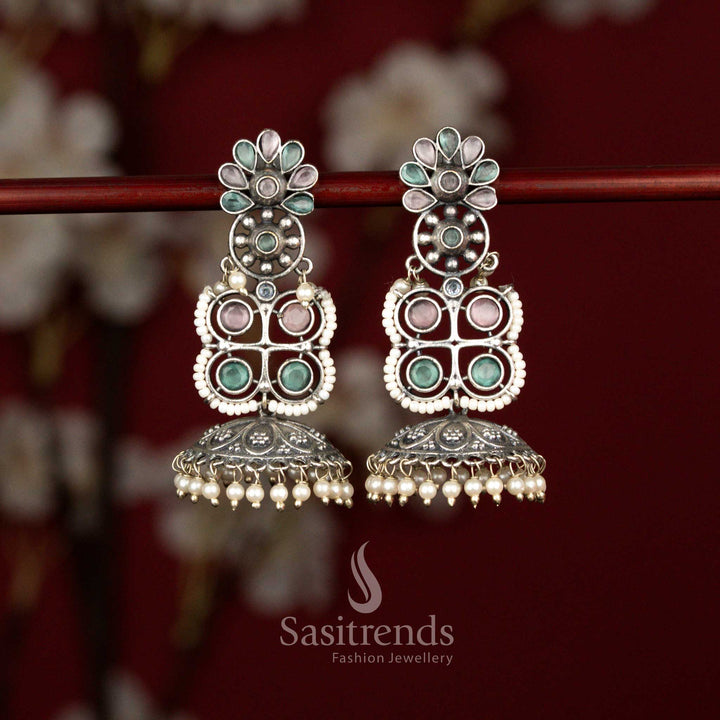 Opulent oxidised fusion jhumka earrings highlighted with pink mint stone detailing and pearl hangings perfect for traditional gatherings – Sasitrends