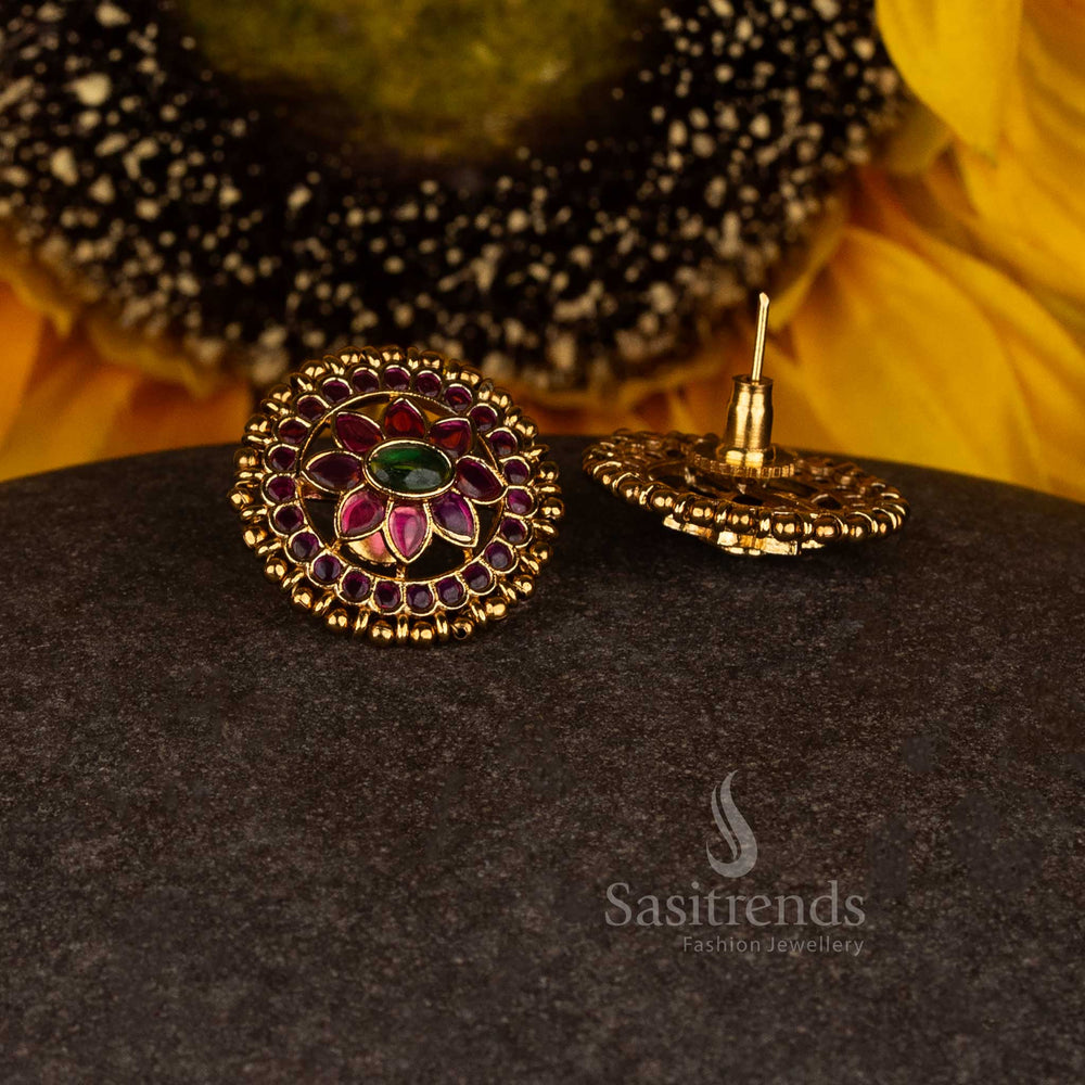 Elegant divine blossom matte gold plated lotus cluster temple stud earrings showcasing vivid design and striking ruby-green highlights - Sasitrends