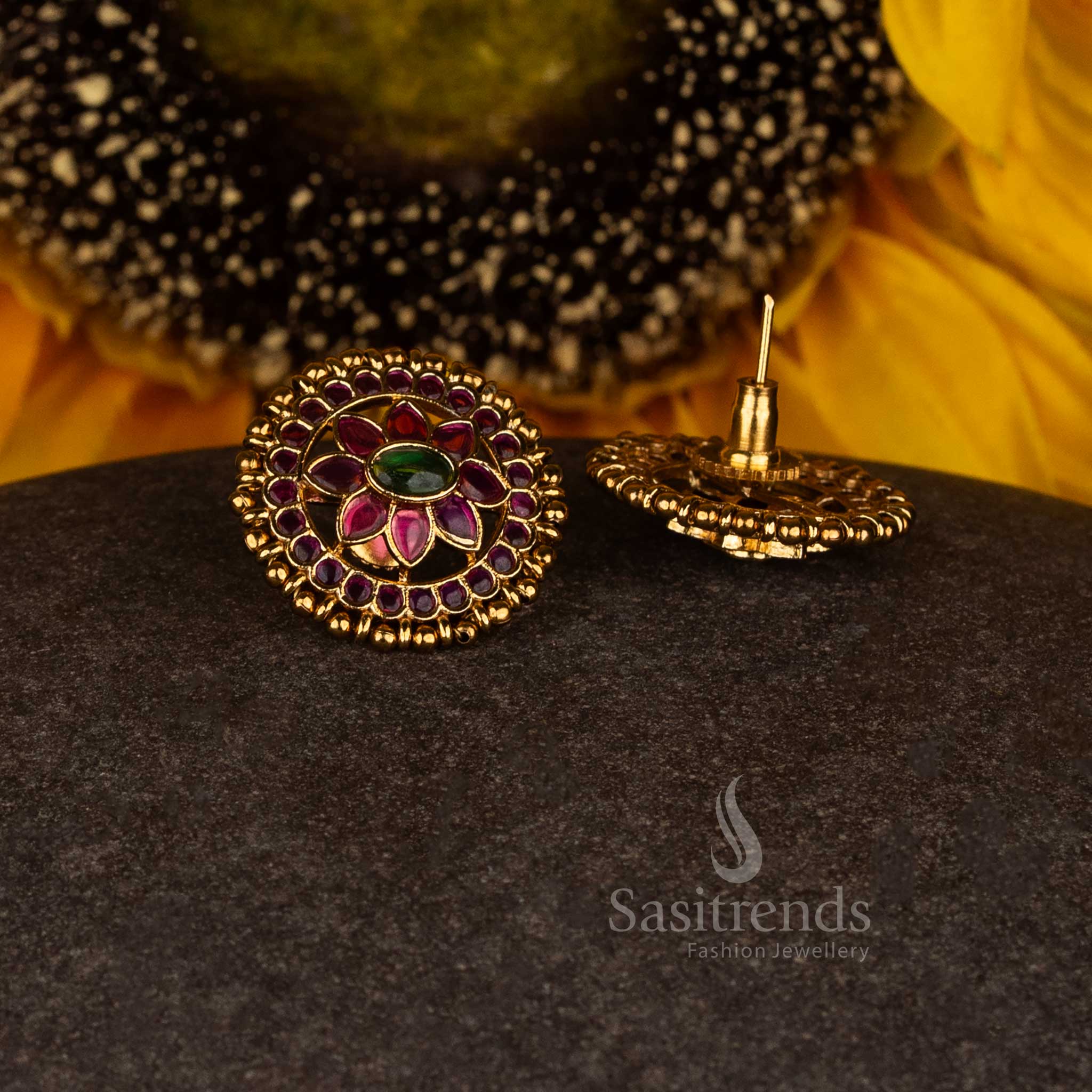 Elegant divine blossom matte gold plated lotus cluster temple stud earrings showcasing vivid design and striking ruby-green highlights - Sasitrends