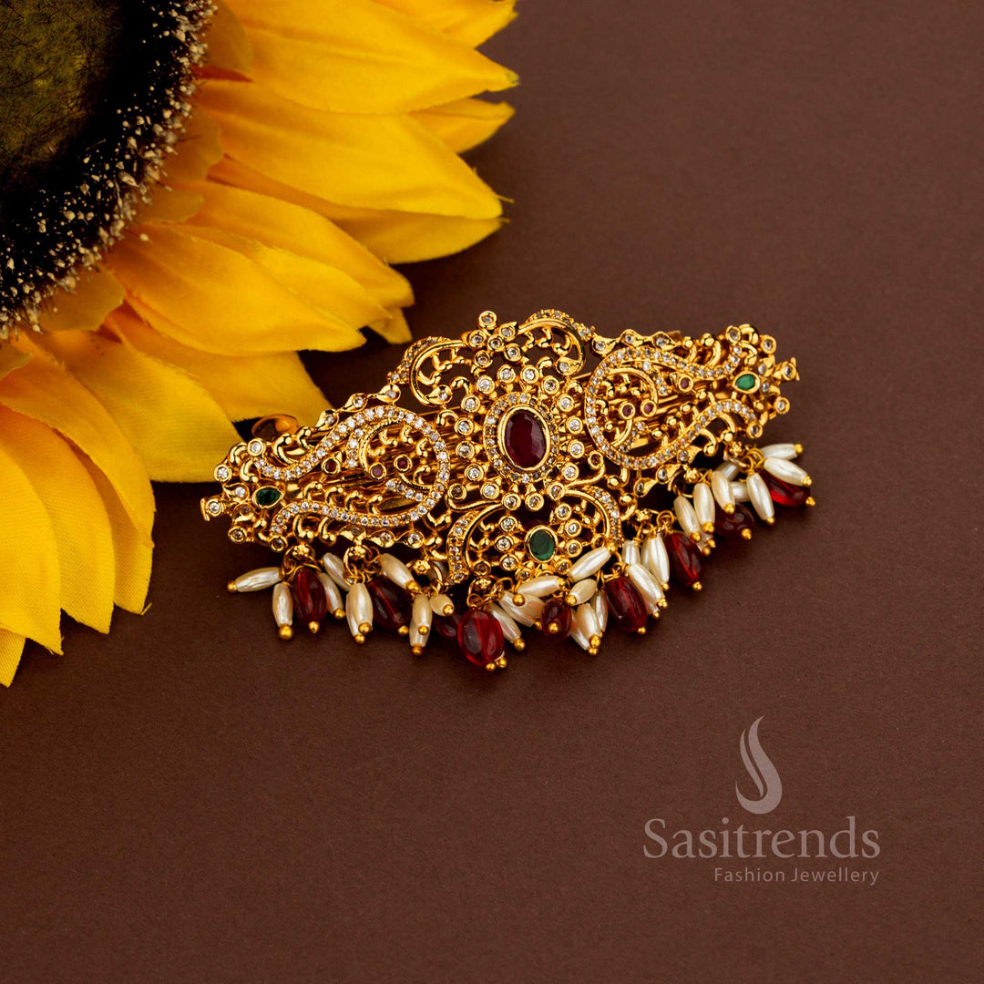 Eternal red AD rice pearl hair clip adorned with celestial oval floral artistry sovereign matte gold craftsmanship illustrious heritage beauty and resplendent elegance styled for noble weddings – Sasitrends
