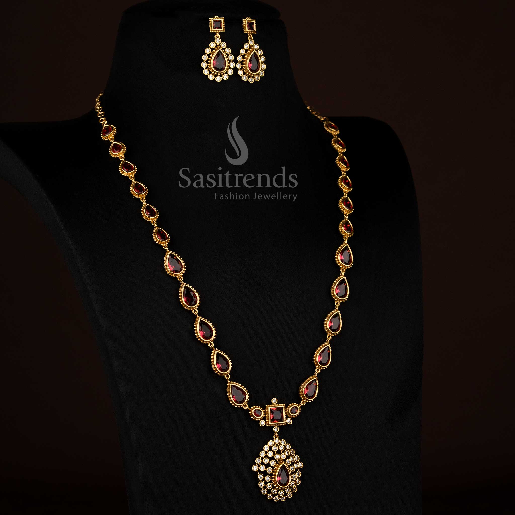 Attractive red American Diamond matte gold plated teardrop stone long necklace ideal for festive occasions - Sasitrends