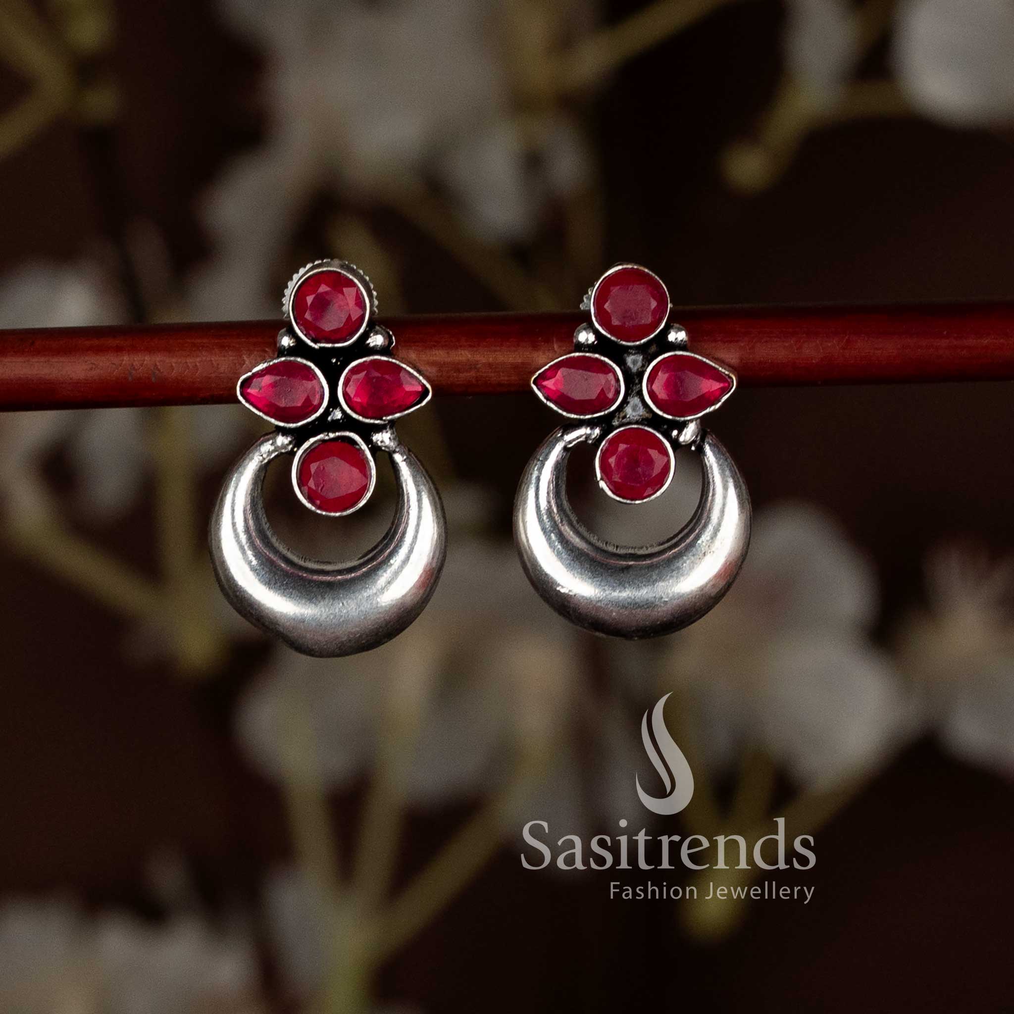 Artistic Red oxidised floral half moon earrings radiating Navaratri brilliance and ethnic charm, designed for saree wear by Sasitrends