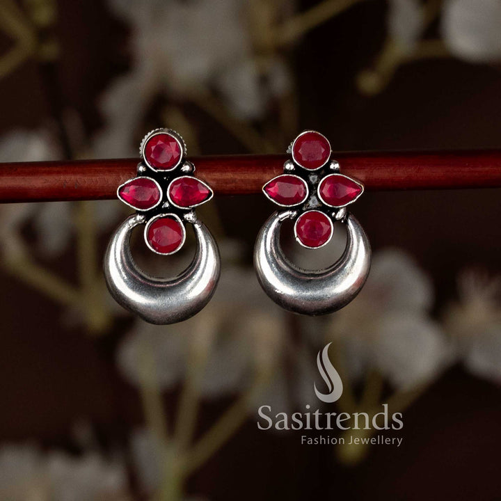 Artistic Red oxidised floral half moon earrings radiating Navaratri brilliance and ethnic charm, designed for saree wear by Sasitrends