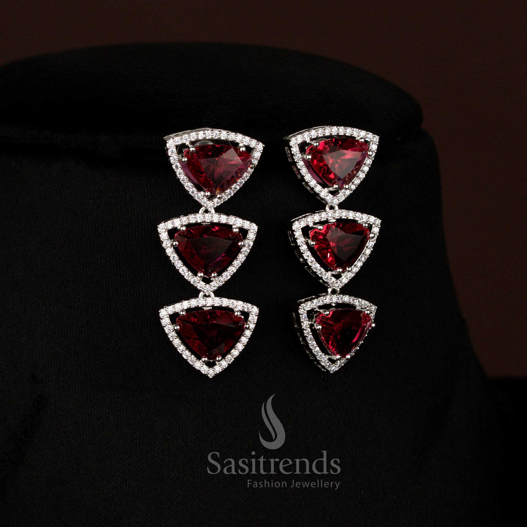 Opulent red rhodium silver triangular earrings with American Diamonds, suitable for grand weddings and special celebrations – Sasitrends
