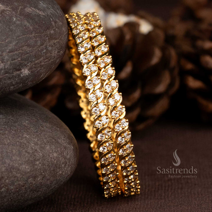 Refined two line bangles in spiral gold design with sparkling white American diamonds, crafted for timeless elegance and cultural charm – Sasitrends