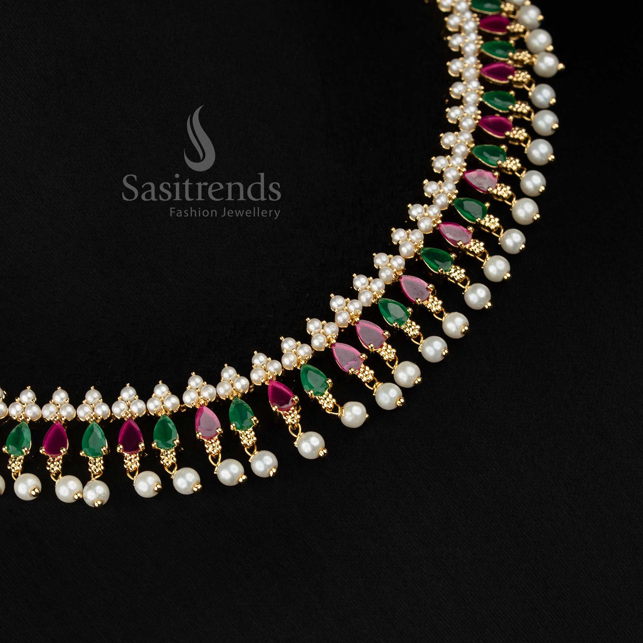 JewelCrest designed micro gold plated pearl ruby green triangle cut teardrop American diamond necklace set finished with pearl drops for festive wear - Sasitrends