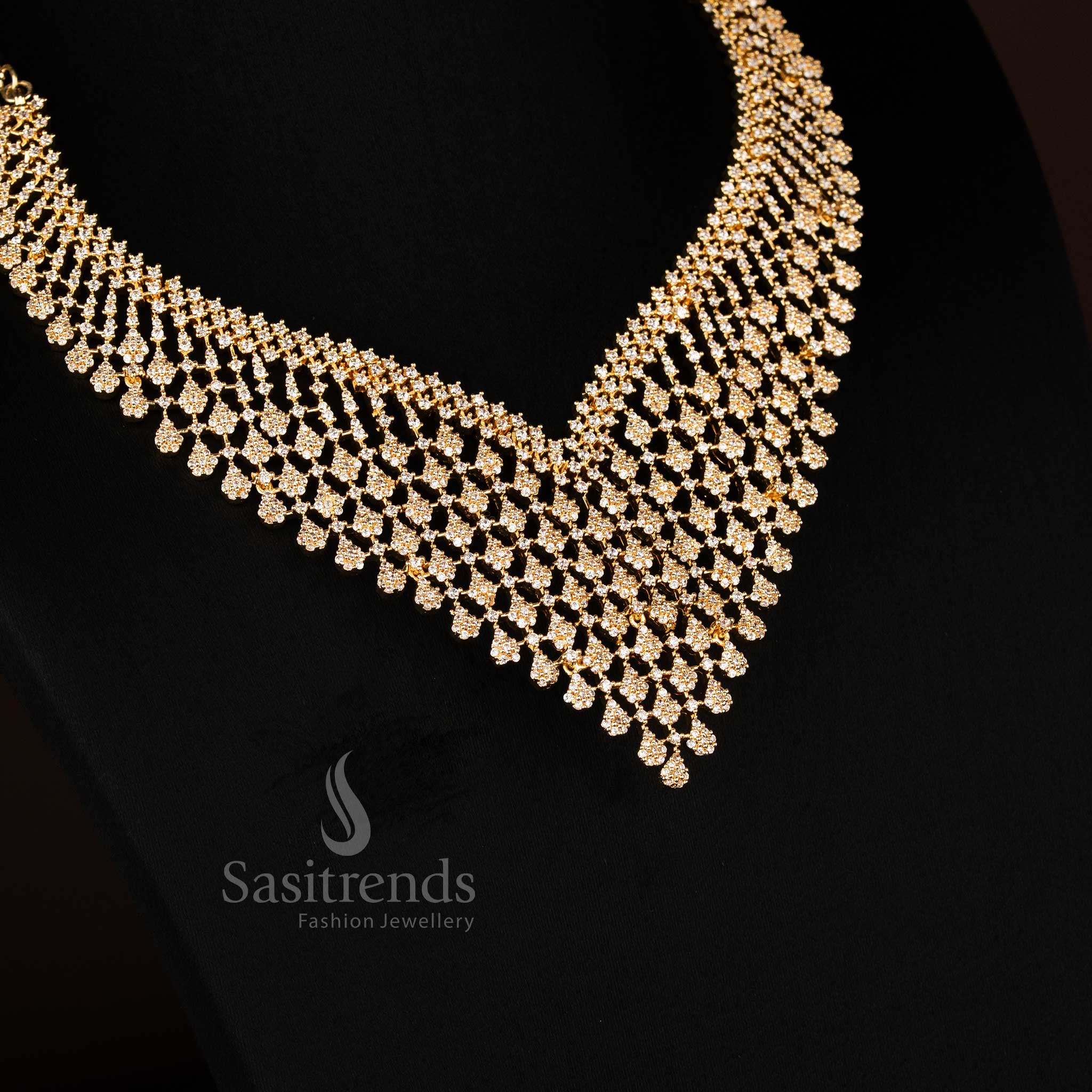 Graceful American Diamond Lotus V-Shape Necklace crafted in gleaming gold plating, reflecting timeless sophistication for festive celebrations – Sasitrends