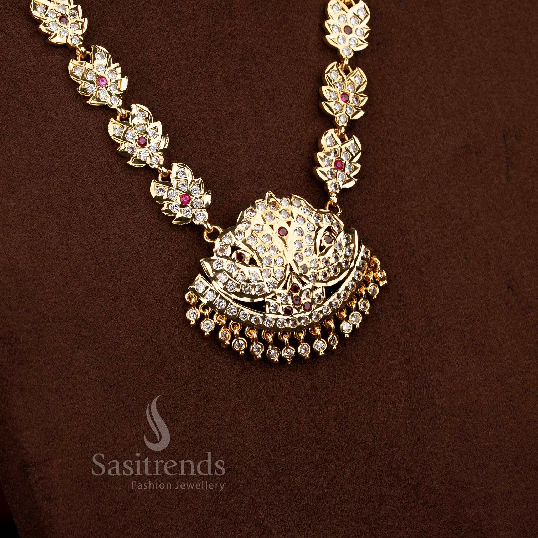 Exquisite traditional impon addigai micro gold plated long haram necklace with leaf lotus motifs white ruby colour for bridal ceremonial wear - Sasitrends
