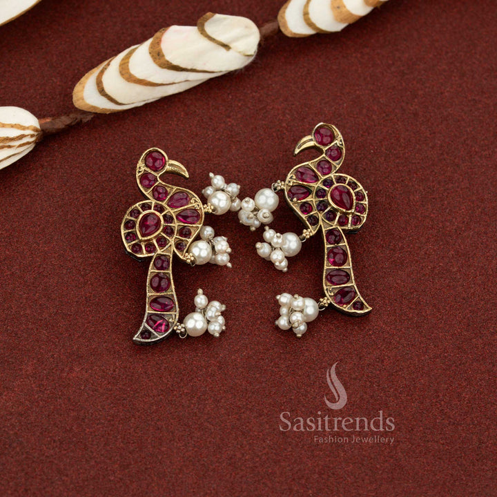 Crimson heirloom ruby antique oxidised peacock pearl drop stone earrings perfect for celebration wear, wedding functions, and elegant saree styling – Sasitrends