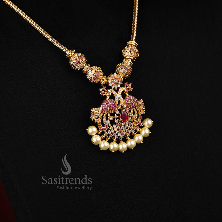Graceful white ruby micro gold plated peacock AD pendant necklace jewellery set adorned with sparkling stones, beautiful accessory for festive wear and bridal saree looks - Sasitrends