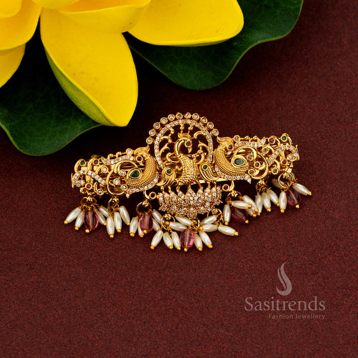 Magnificent purple triple peacock temple hair clip styled with celestial matte gold artistry ornate AD stones eternal pearl accents and noble refinement designed for illustrious bridal grandeur – Sasitrends