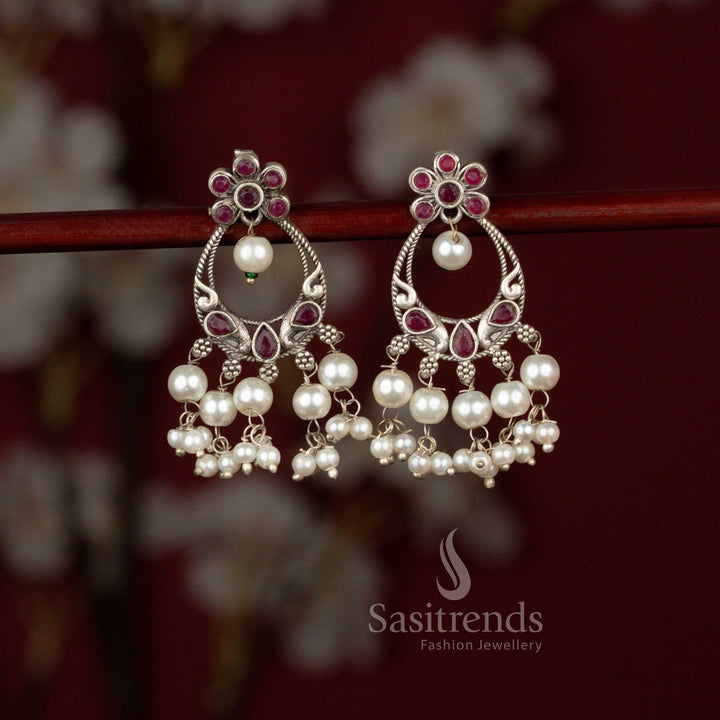 Dazzling oxidised silver Mayura chandbali earrings with rich ruby stones and pearl drops perfect for Navaratri garba and saree styling – Sasitrends