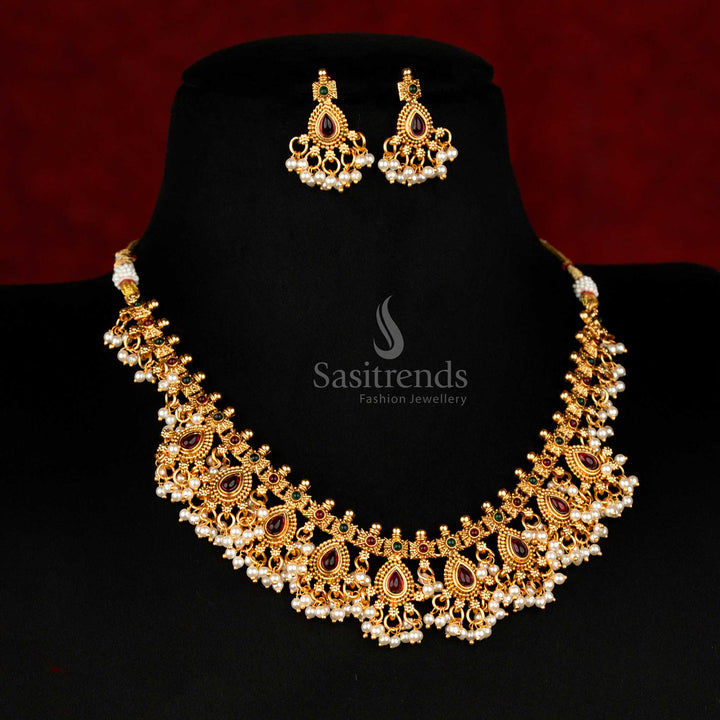 Majestic Legacy Matte Gold Temple Style Necklace Set Adorned with Ruby-Green Stones and Pearl Hangings – Divine Look Jewellery – Sasitrends