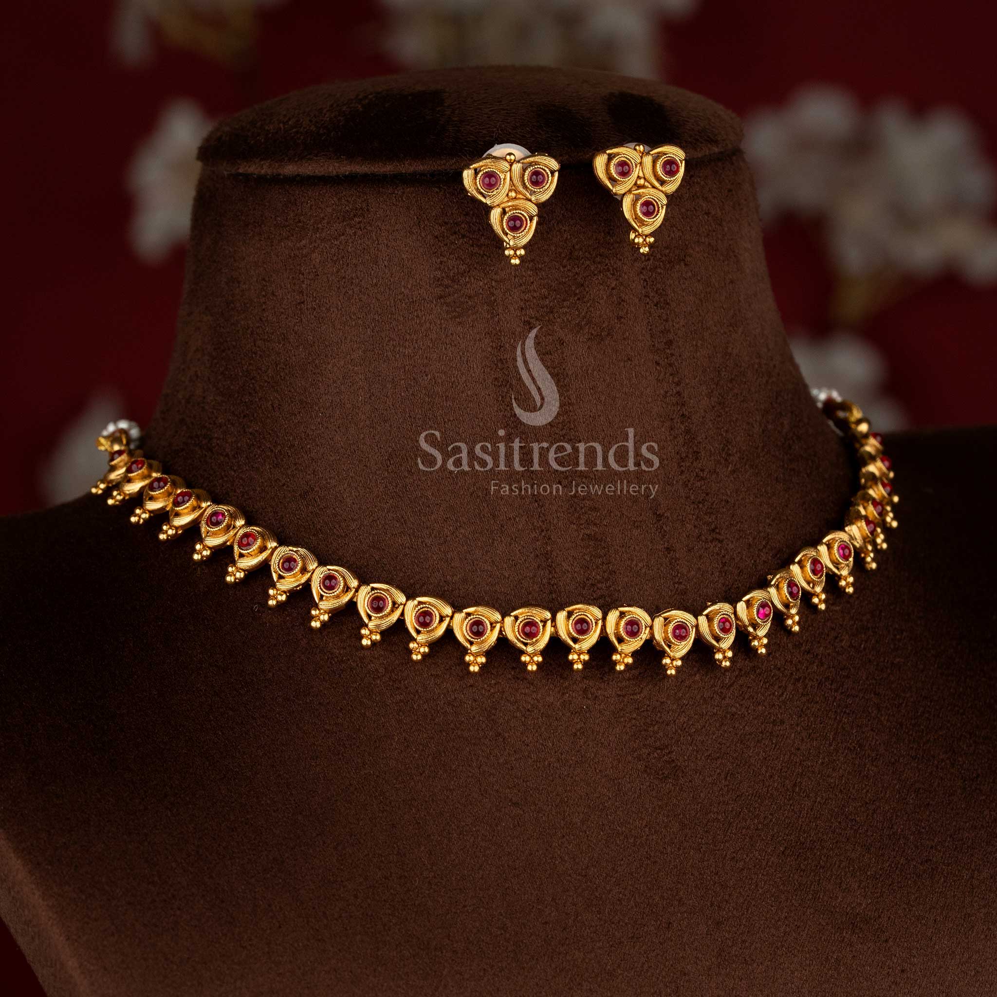 Cherished classic matte gold plated ruby artwork necklace set with drop earrings for vibrant celebration looks – Sasitrends