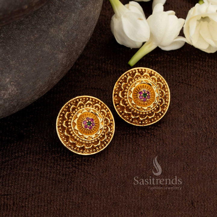 Celestial Ruby Green Stud Earrings With Radiant AD Detailing And Matte Gold Finish – Illustrious Traditional Jewellery Crafted For Divine Celebrations And Noble Grace – Sasitrends