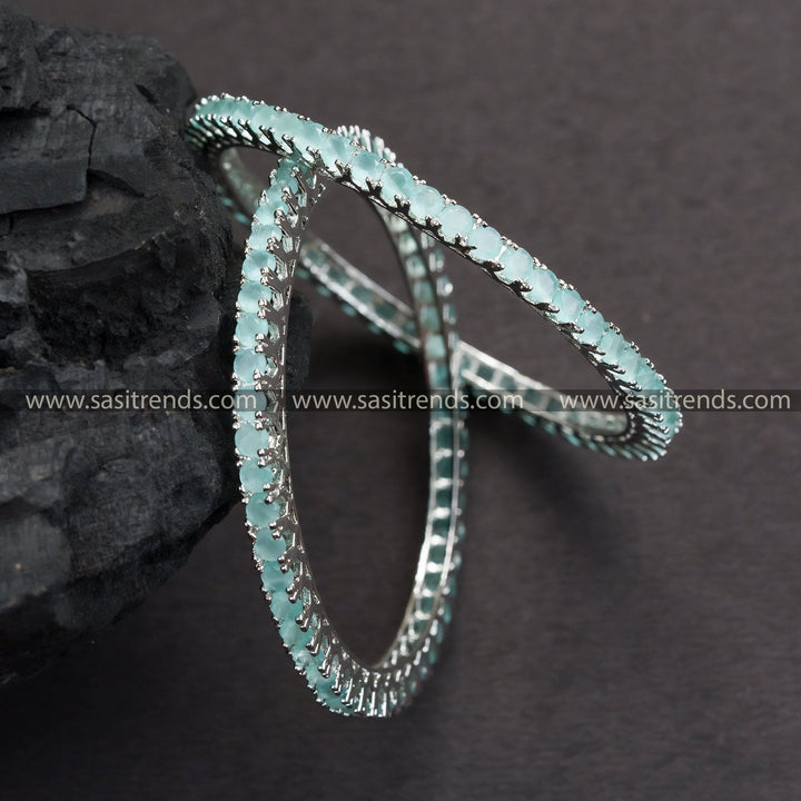 Party Wear Rhodium Silver Bangles with Mint Green AD Stones