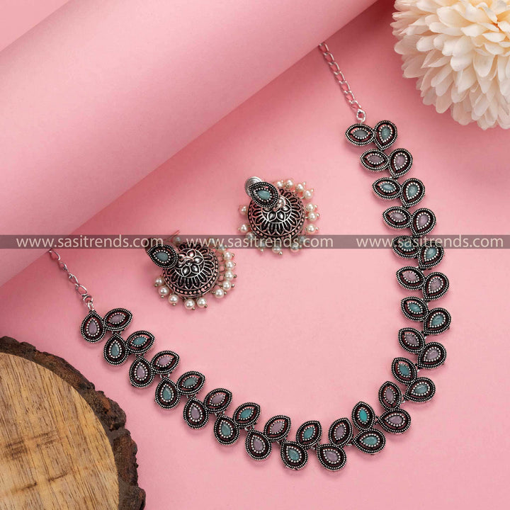 Timeless Glamour: Oxidised Silver Necklace adorned with Pink and Mint Stones and Pearl Jhumkas - Fashion Delight