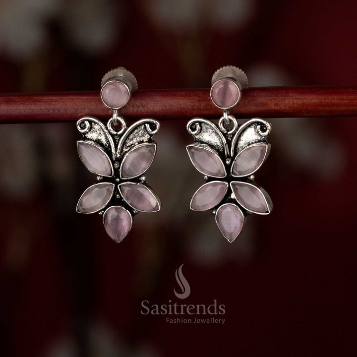 Blush pink oxidised butterfly earrings with gentle sway for feminine daytime wear – Sasitrends.