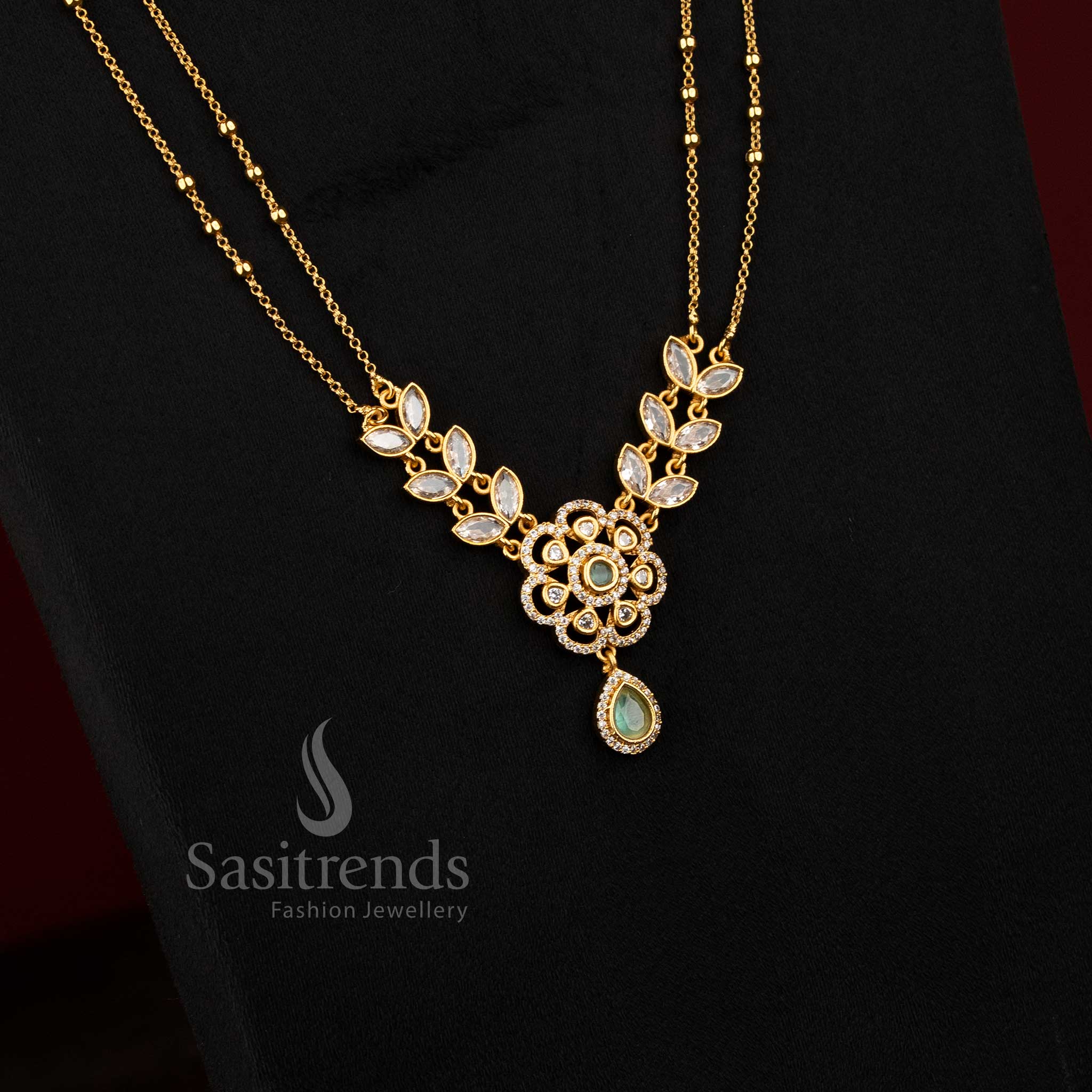 Graceful American diamond matte gold dual layer two line floral necklace set in mint for women, perfect for weddings and grand traditional occasions – Sasitrends