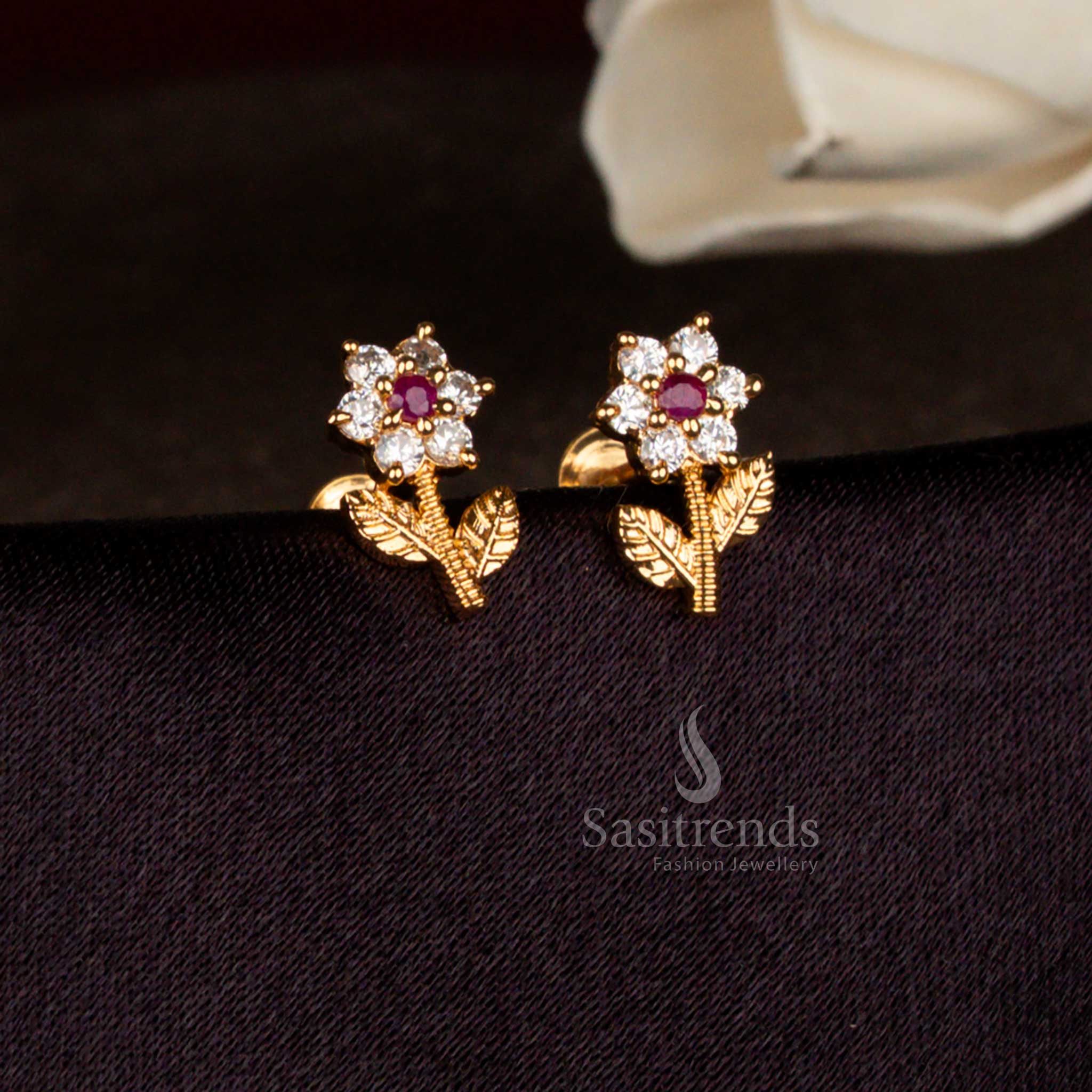 Heritage glow white ruby American diamond micro gold plated floral sprig stud earrings perfect for traditional ceremonies, family gatherings, and chic festive styling – Sasitrends