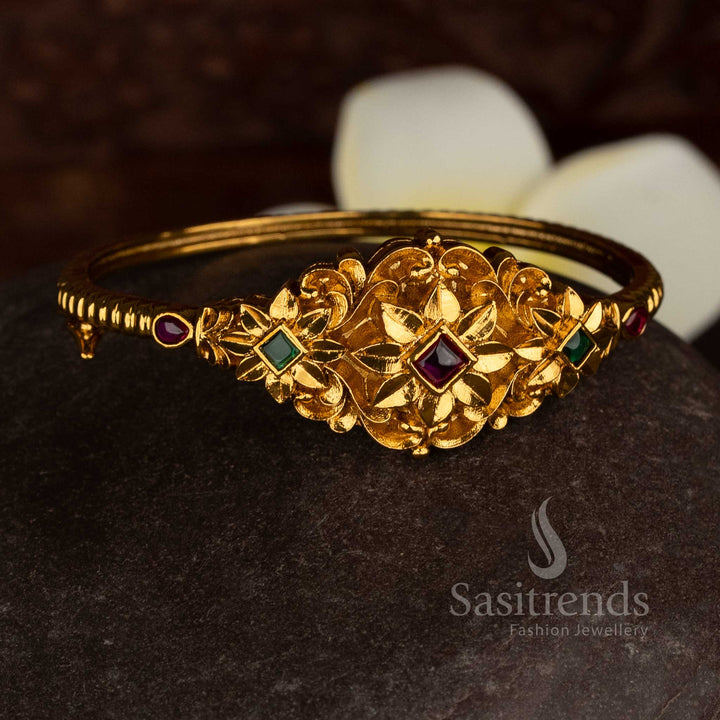 Opulent floral design diamond cut AD matte gold plated ruby green single kada bracelet for festive elegance jewellery - Sasitrends