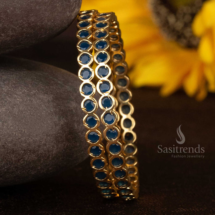 Vibrant blue Addigai bangles in micro gold plated finish with circular stone highlights, showcasing graceful festive appeal with ethnic artistry – Sasitrends