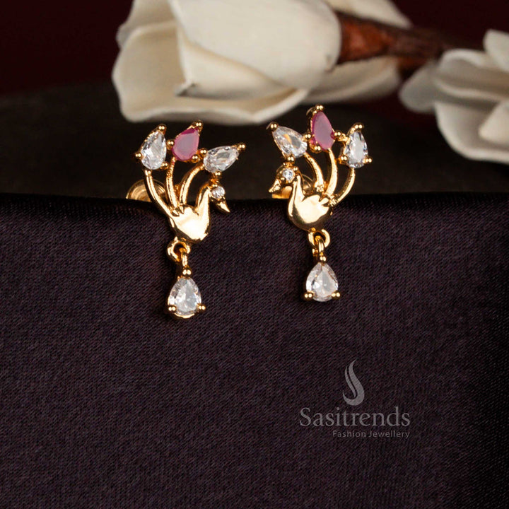 Heritage spark white ruby American diamond micro gold plated stylized peacock teardrop stud earrings perfect for festive functions, family ceremonies, and stylish gatherings – Sasitrends