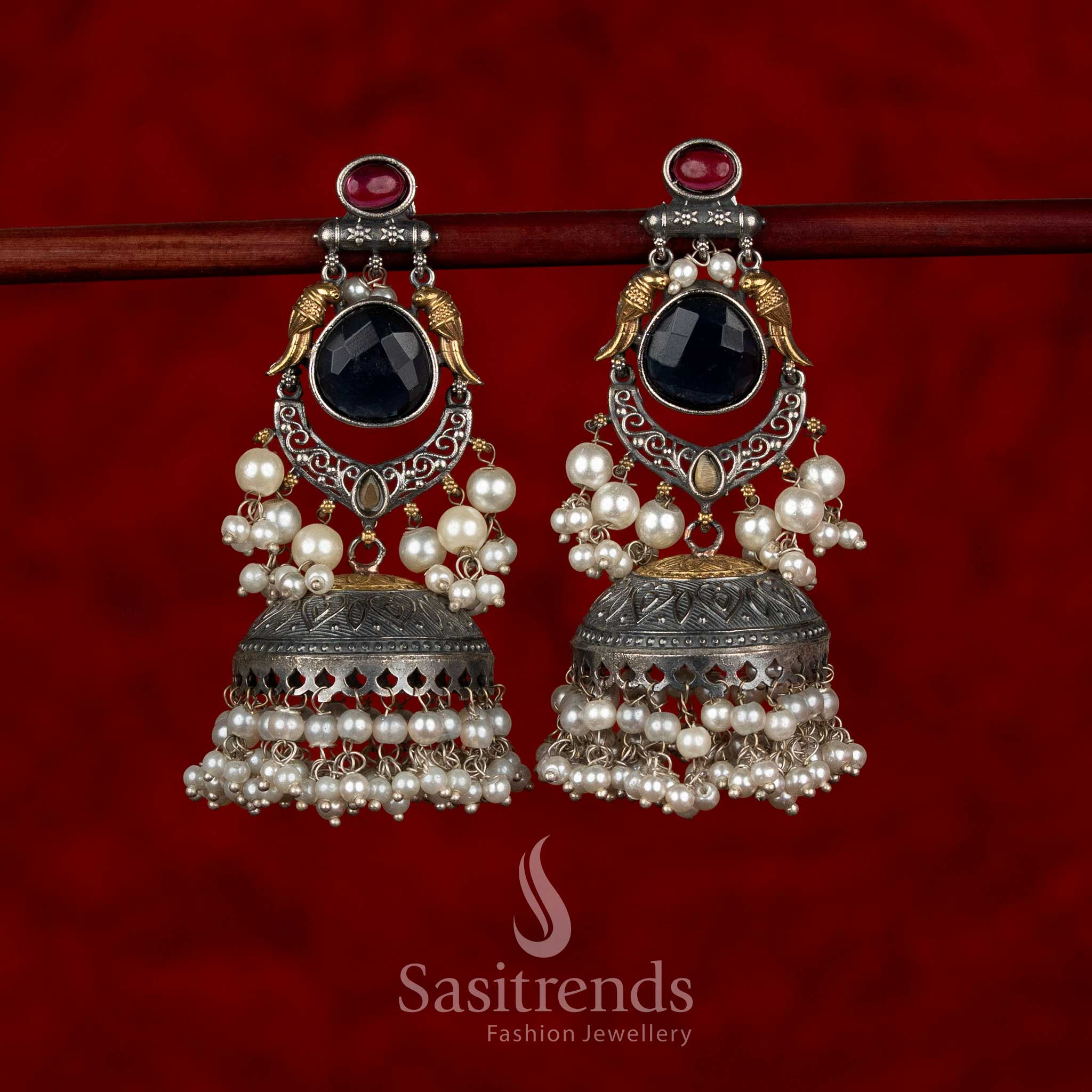 Opulent dual tone 92.5 silver plated oxidised bird crescent dangler earrings blue ruby colour for evening celebrations Sasitrends