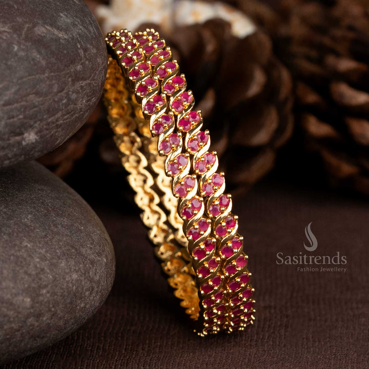 Royal spiral two line bangles in gold plating with bold ruby American diamonds, tailored for traditional brilliance and wedding ensemble beauty – Sasitrends

