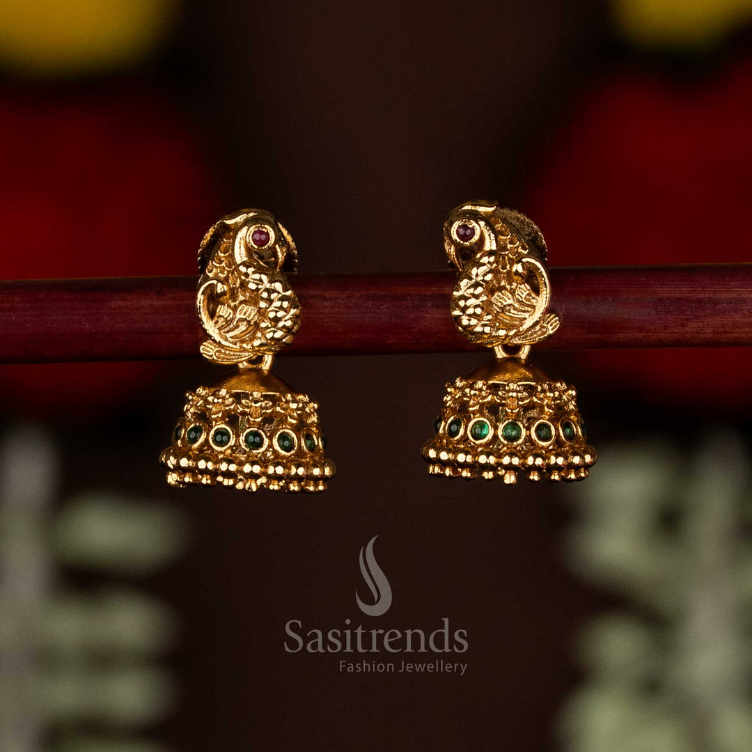 Royal ruby-green matte gold peacock AD jhumka earrings with elegant design for bridal and festive events – Sasitrends