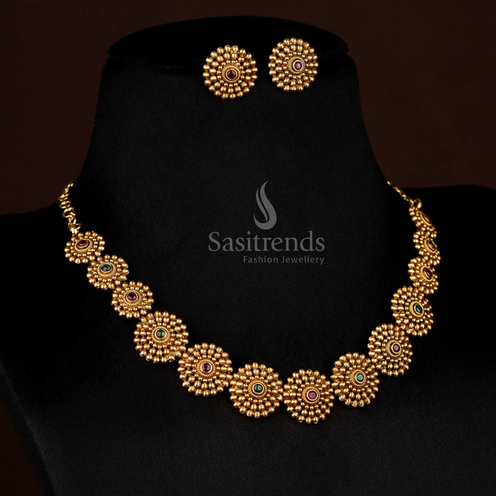 Opulent ruby-green matte gold plated temple round floral necklace adorned with AD stones, ideal to wear for festive ceremonies and celebrations – Sasitrends